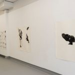 Abstract works of ink on the gallery wall