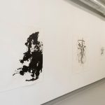 Abstract works of ink on the gallery wall