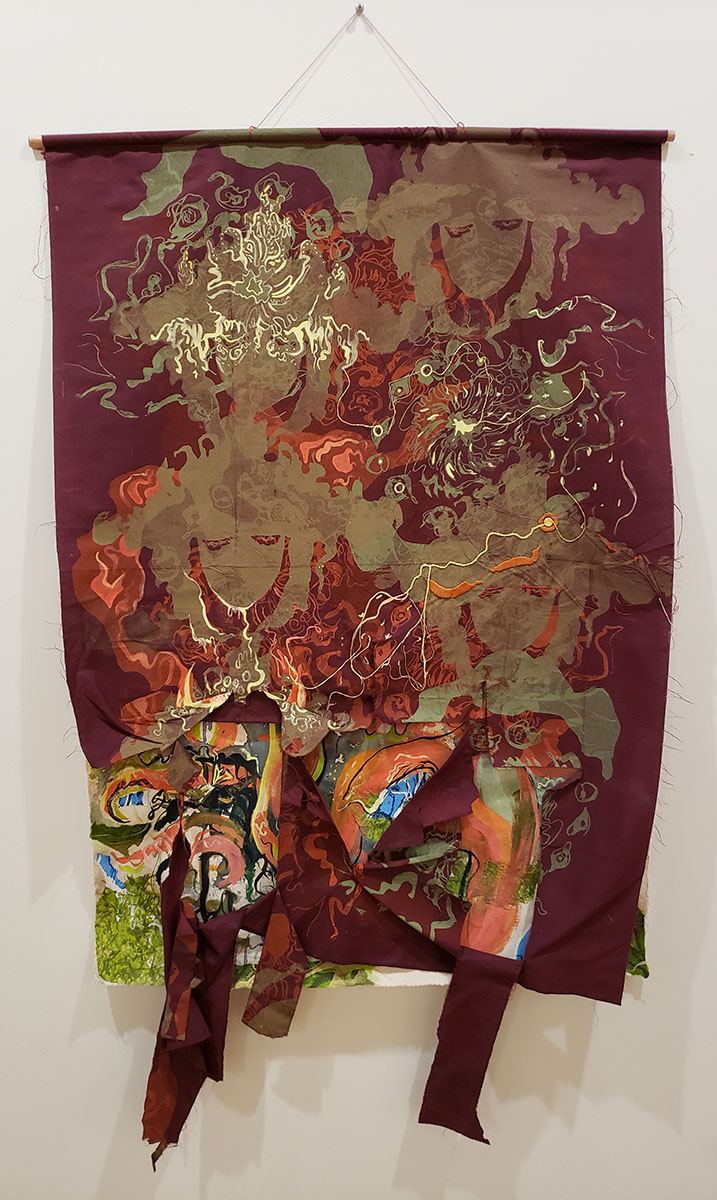 A collection of fabric art from the display