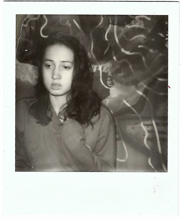 A photo of a young woman looking depressed