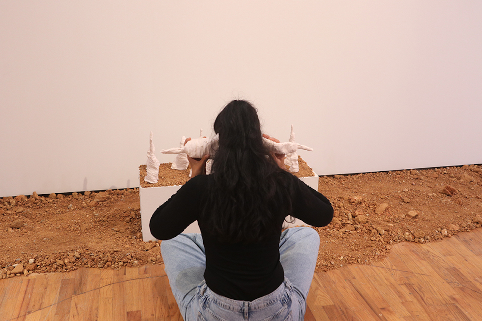 A woman working on the installation