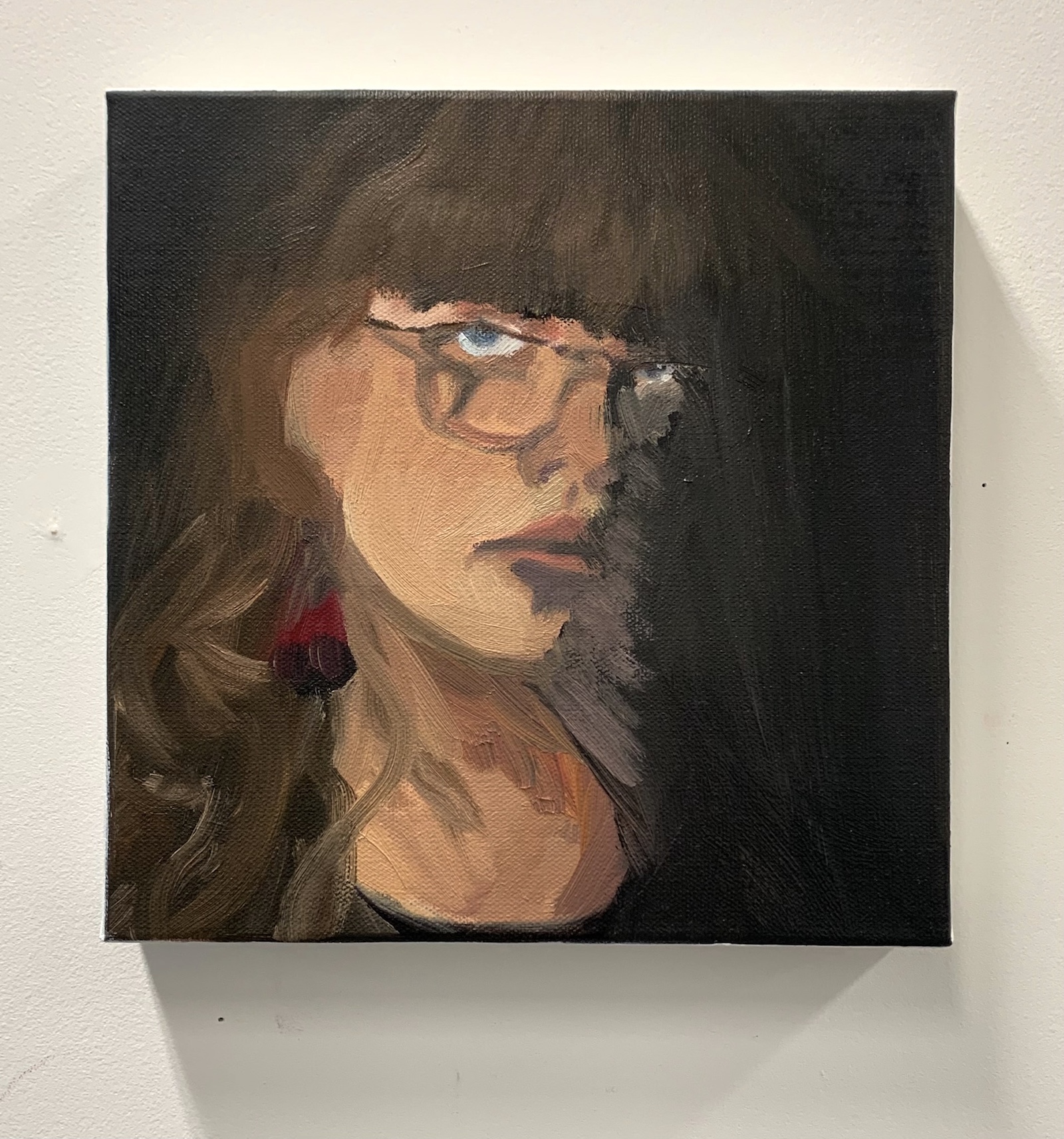 A portrait painting of a woman with glasses